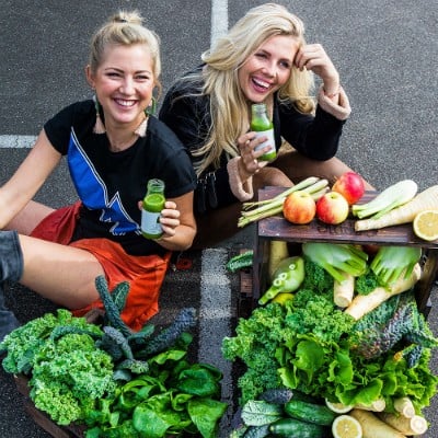 women with a green juice